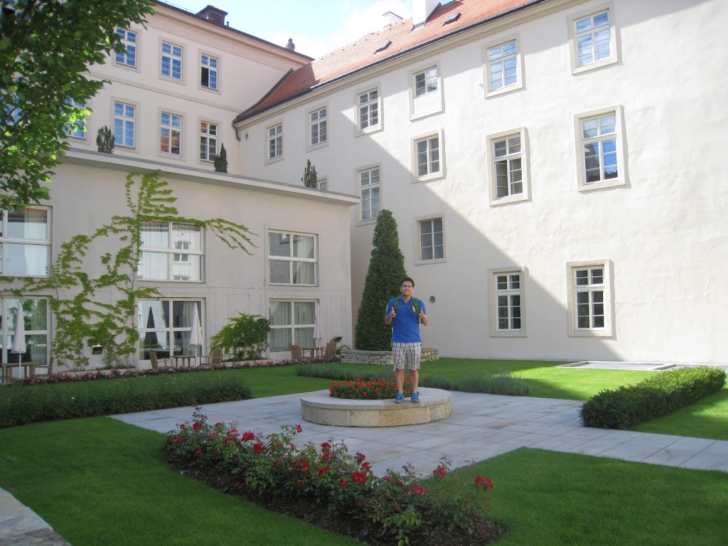 a man standing in front of a building
