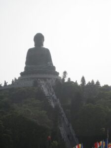 a large statue on a hill