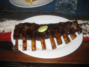 a plate of ribs on a table