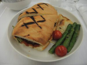 a sandwich and vegetables on a plate