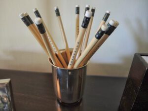 a cup full of pencils