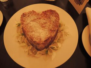 a heart shaped piece of bread on a plate
