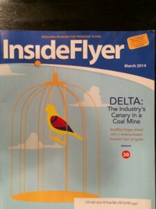 a magazine cover with a bird on it