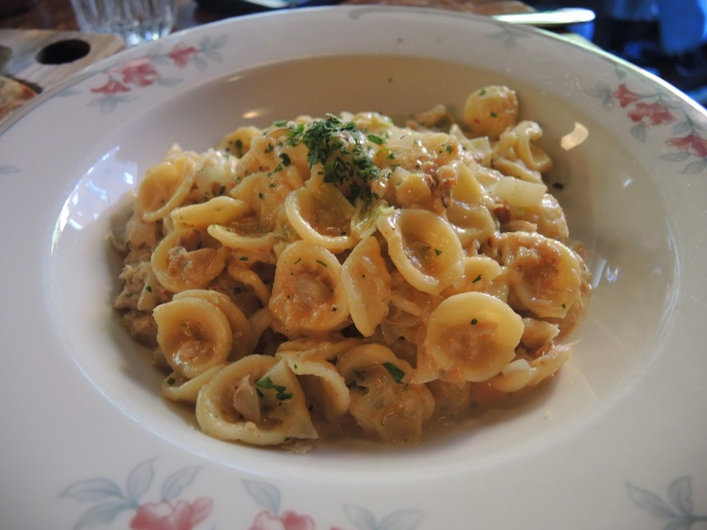 a plate of pasta with sauce