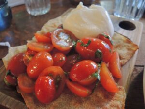 a plate of food on a wooden surface