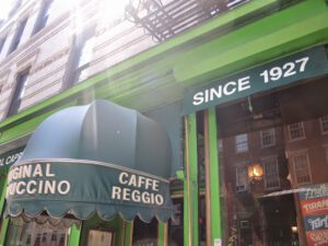 a green awning with white text on it