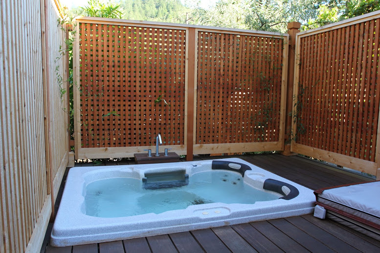 a hot tub on a deck