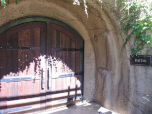 a wooden door in a stone wall