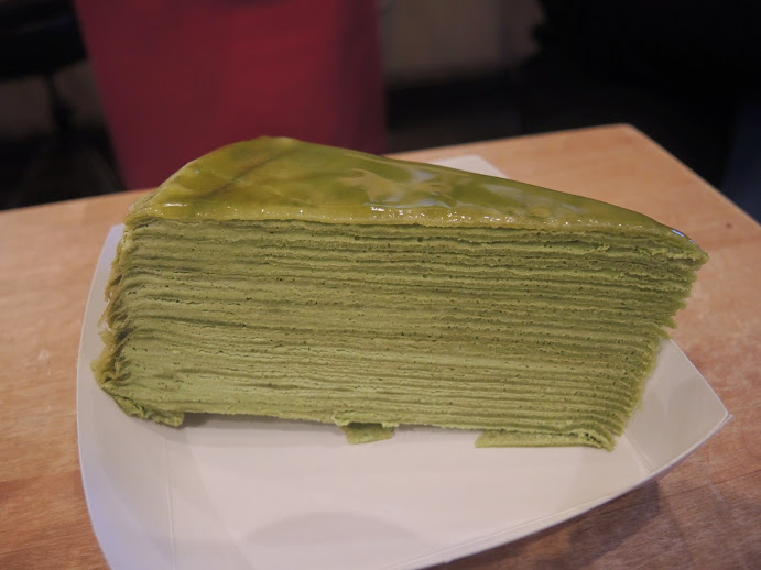 a piece of green cake on a plate