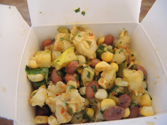 a box of food with beans corn and vegetables