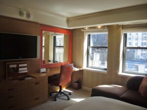 a room with a tv and a couch