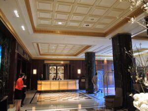 a group of people standing in a lobby