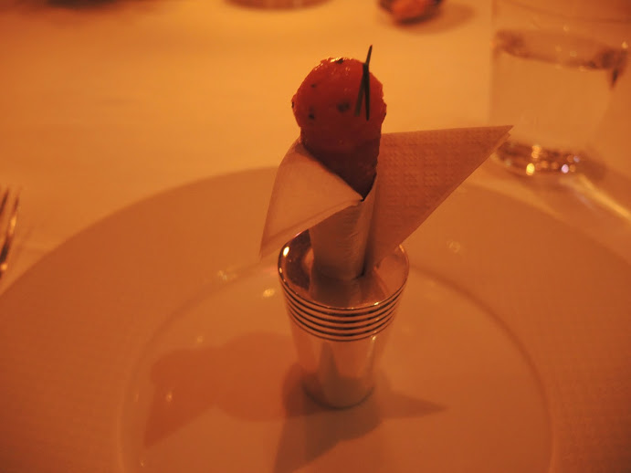 a small food on a napkin holder
