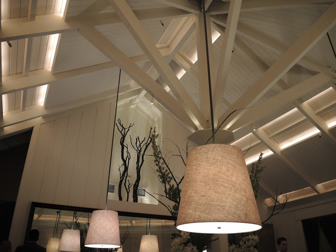 a ceiling with a light shade and a lamp shade