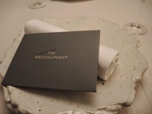 a menu on a plate