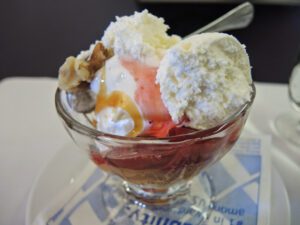 a bowl of ice cream with a spoon