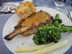 a plate of food with broccoli and meat