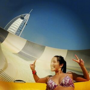 a woman in a garment on a water slide