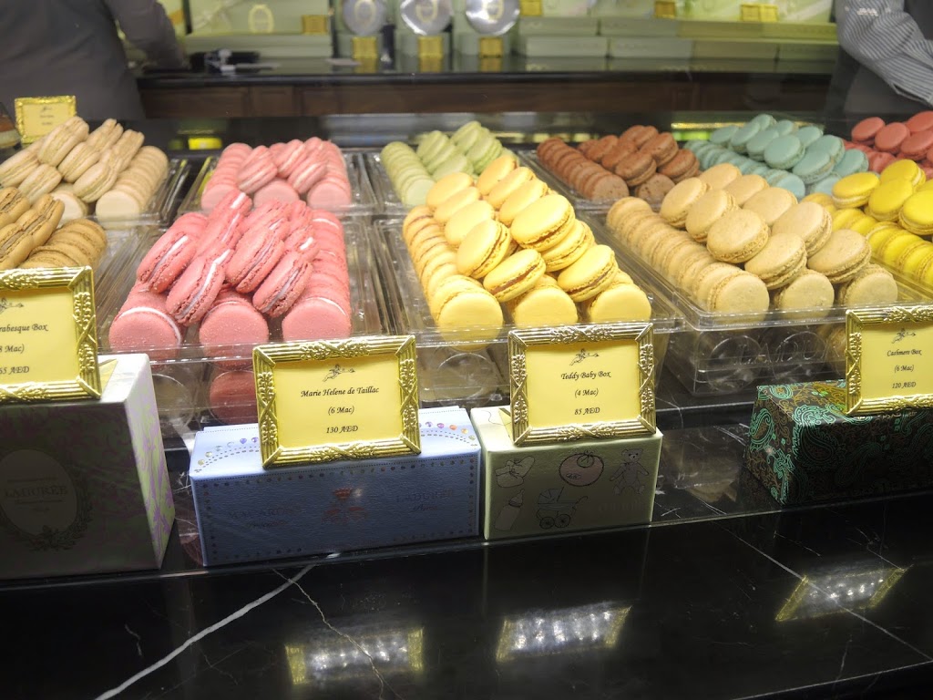 a display of colorful macaroons