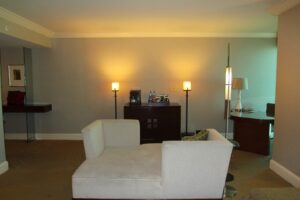a room with a couch and a desk