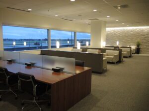 an office with chairs and tables