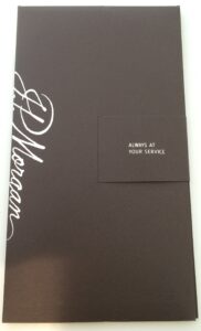 a brown folder with white text