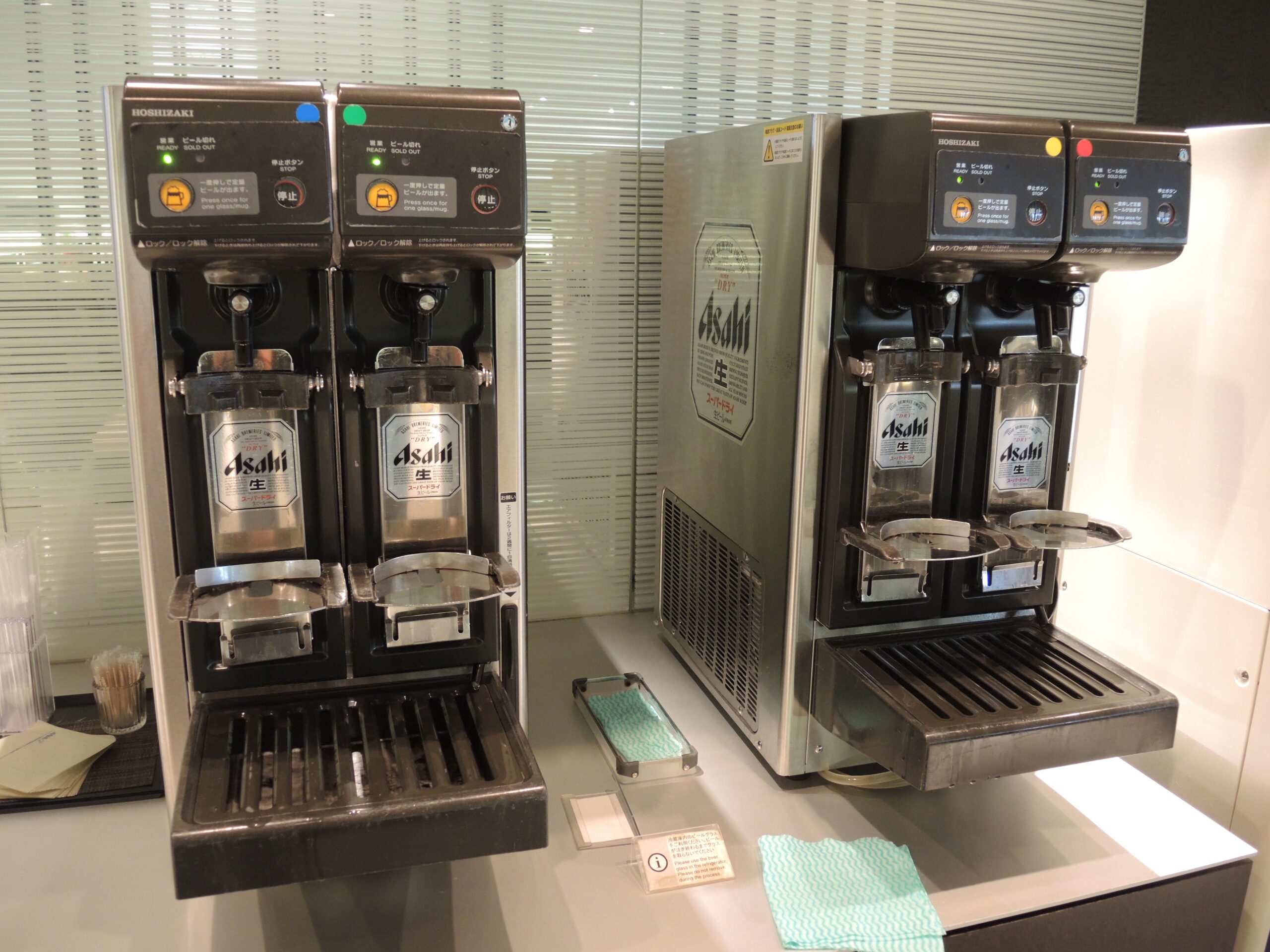 a two coffee machines on a counter