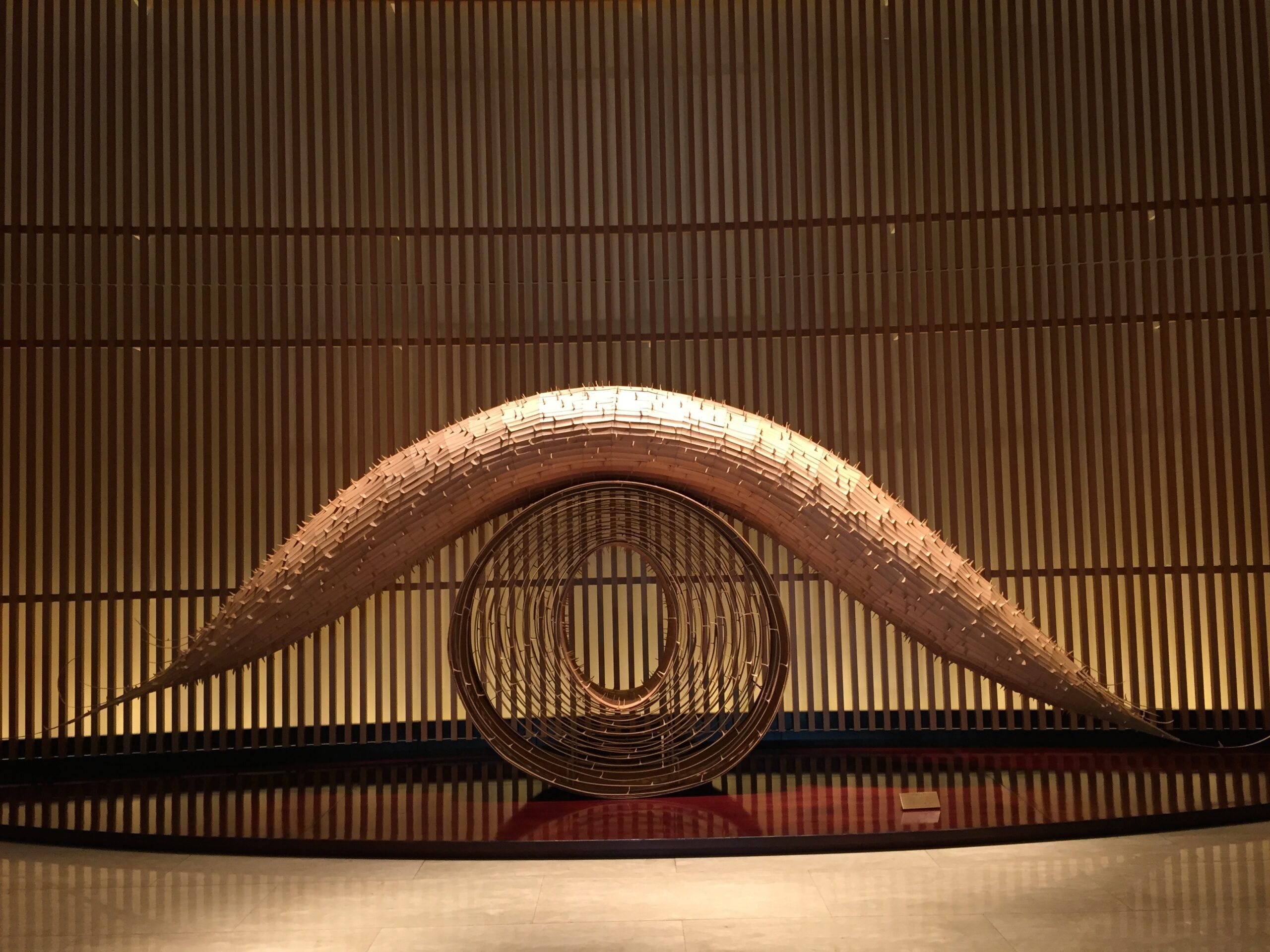 a sculpture of a curved object