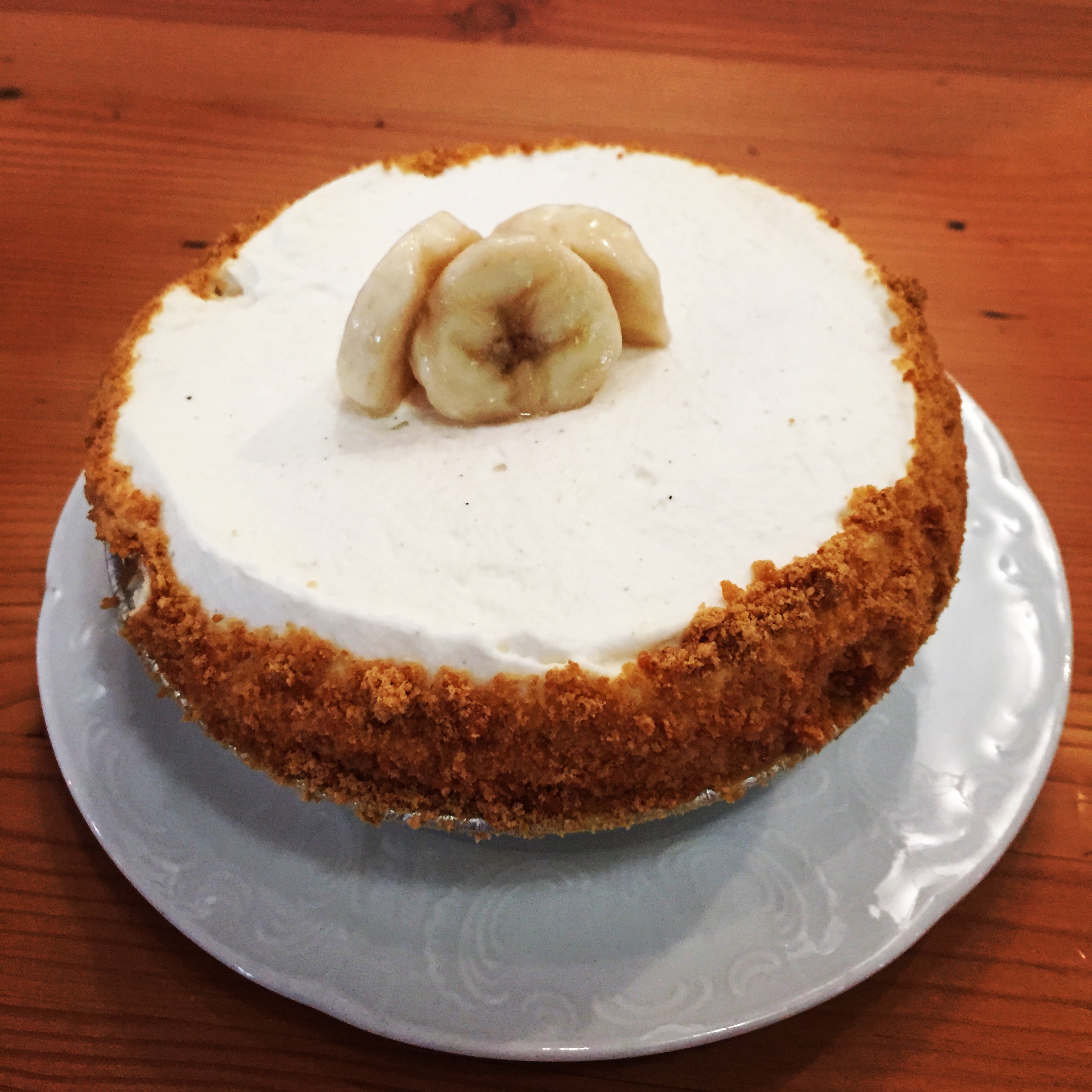 a cake with bananas on top