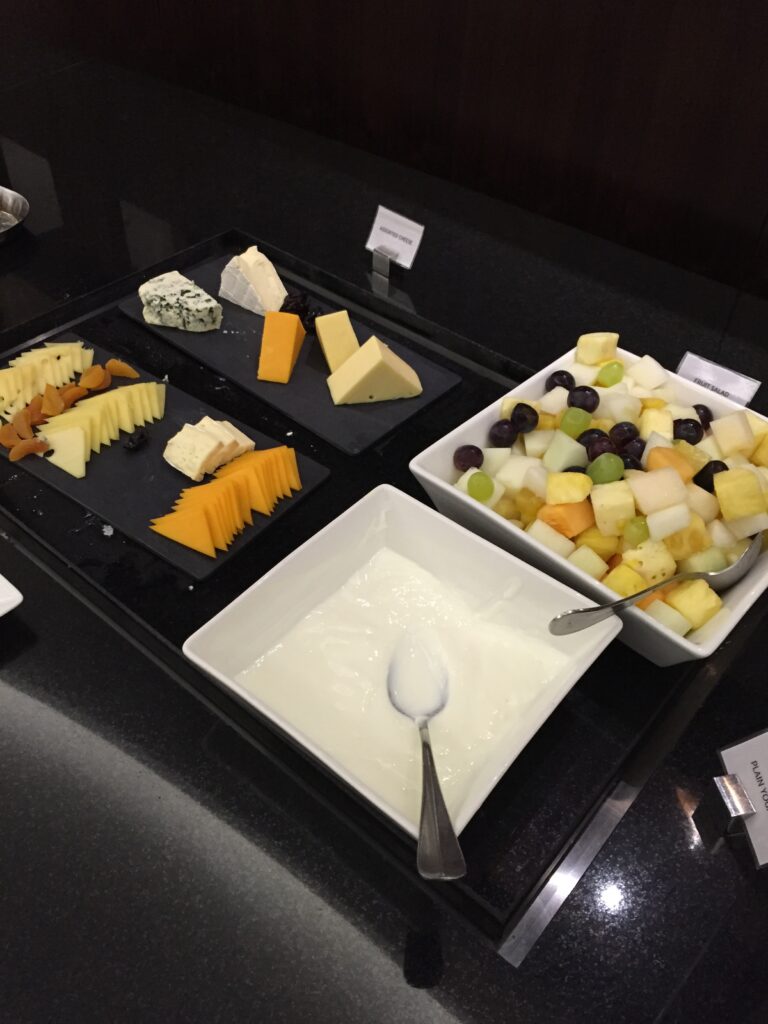 etihad premium lounge auh cheese fruit