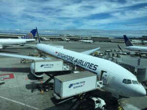 a group of airplanes at an airport