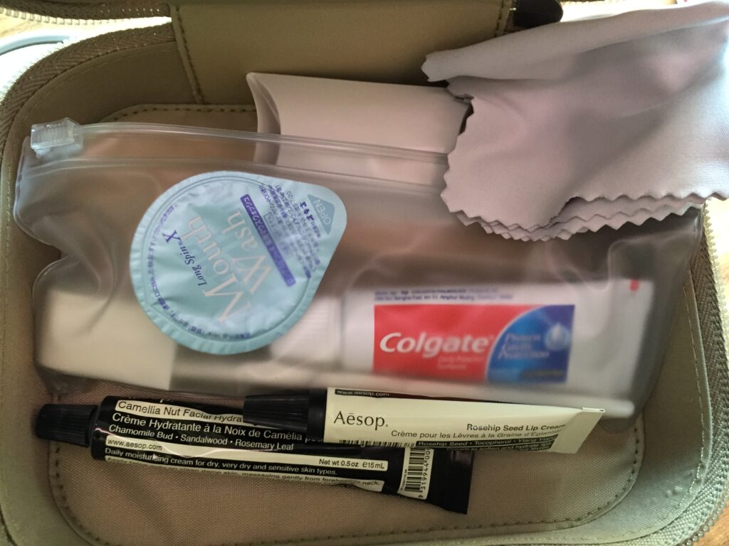 cathay pacific first class hong kong to new york aesop amenity kit contents