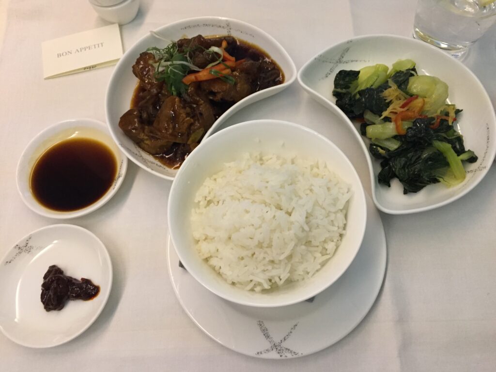 cathay pacific first class hong kong to new york main course