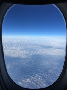 a view of clouds from an airplane window