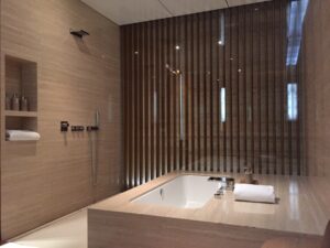 a bathroom with a bathtub and shower