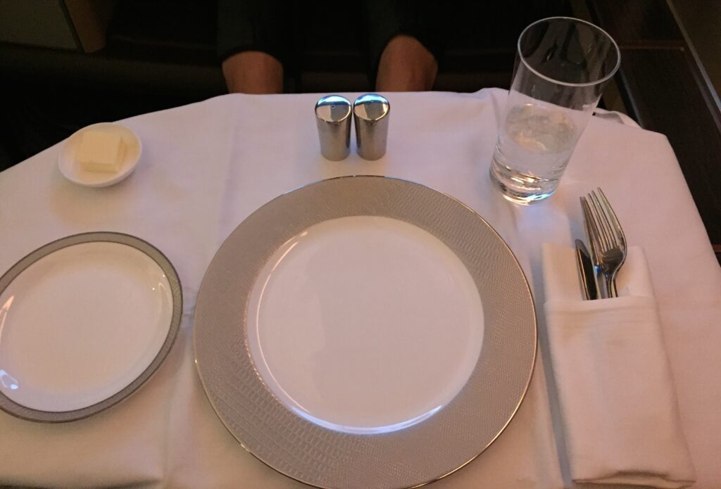 singapore airlines first class san francisco to hong kong dining table